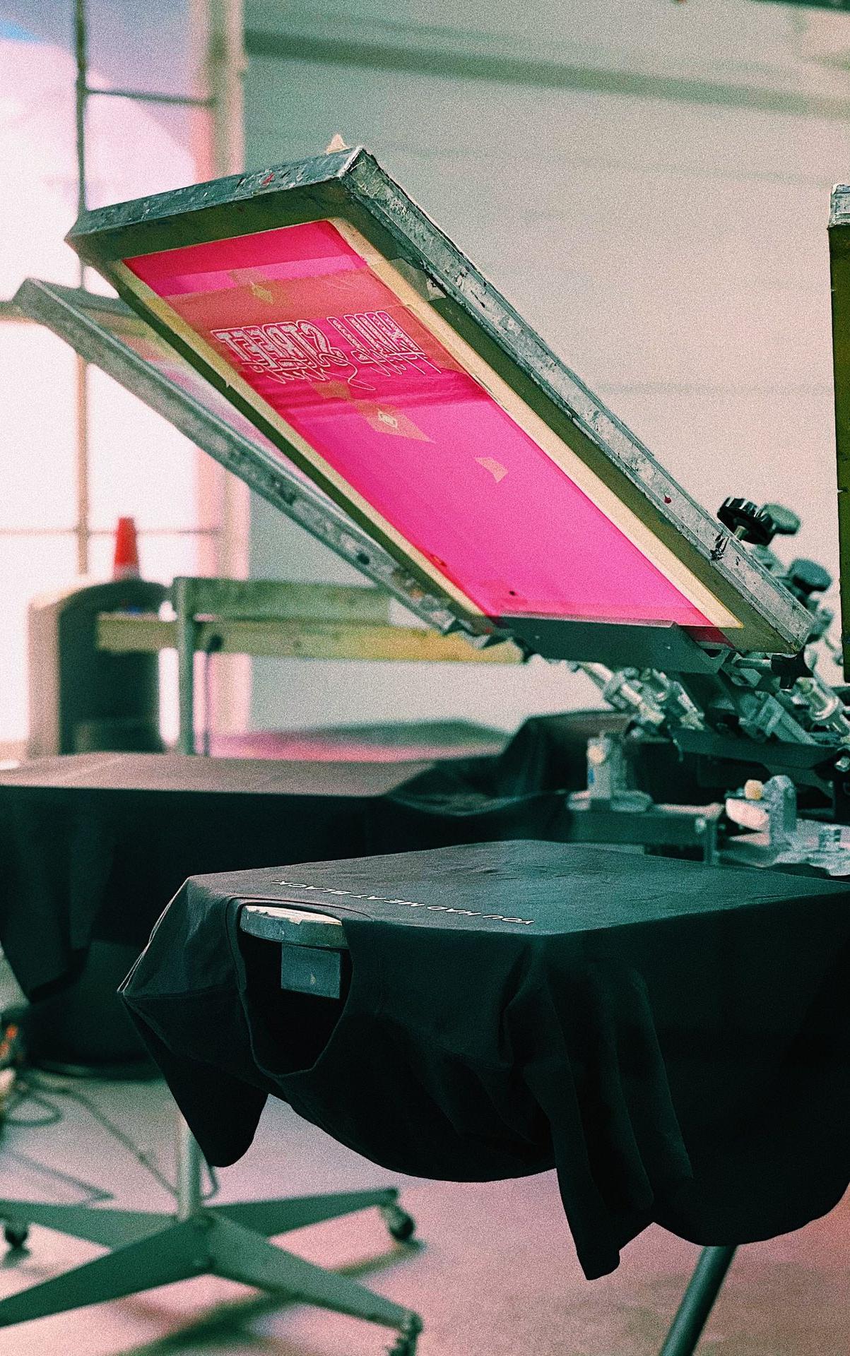 black flat screen tv turned on on black table